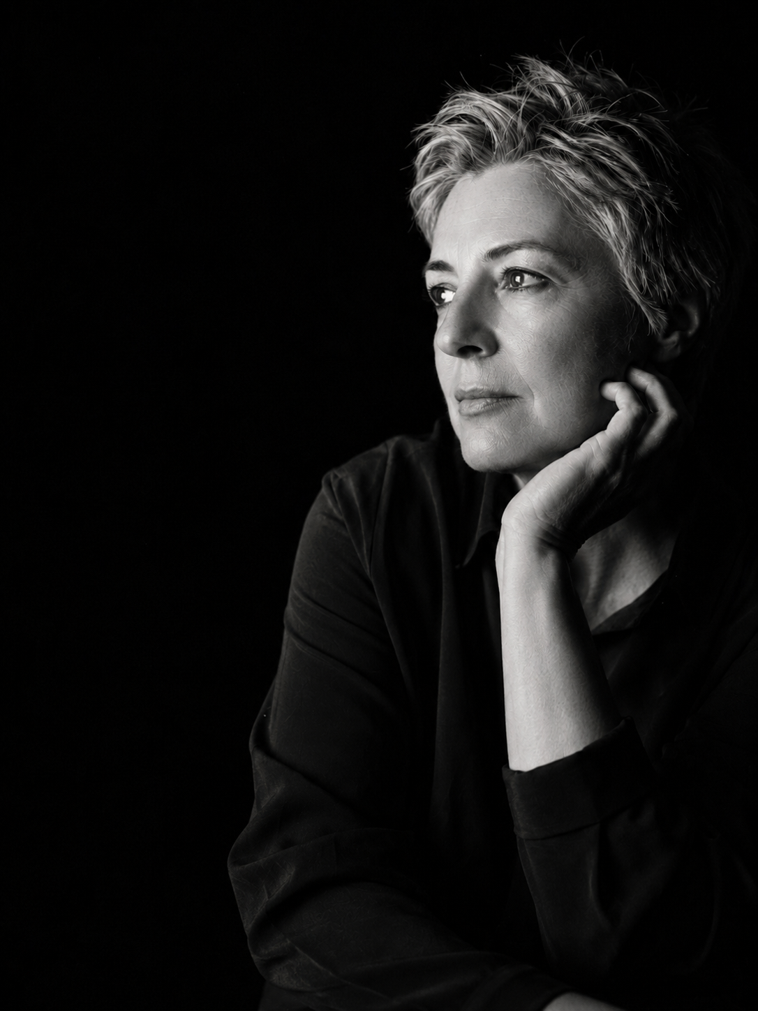 Portrait of an editor looking thoughtfully to the side